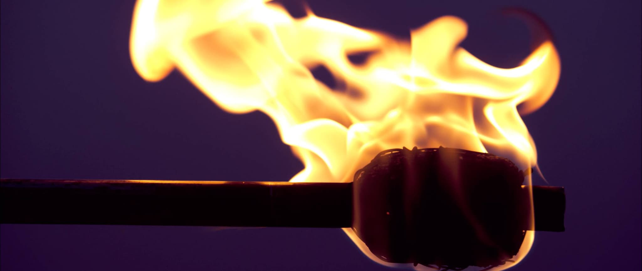 Match on fire illustrating survey fraud burning a brand