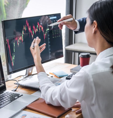 Woman on computer looking at data